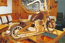 Image of Wood Motorcycle Rocker Detail
