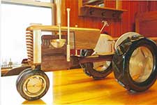 Image of Wood Motorcycle Rocker Detail